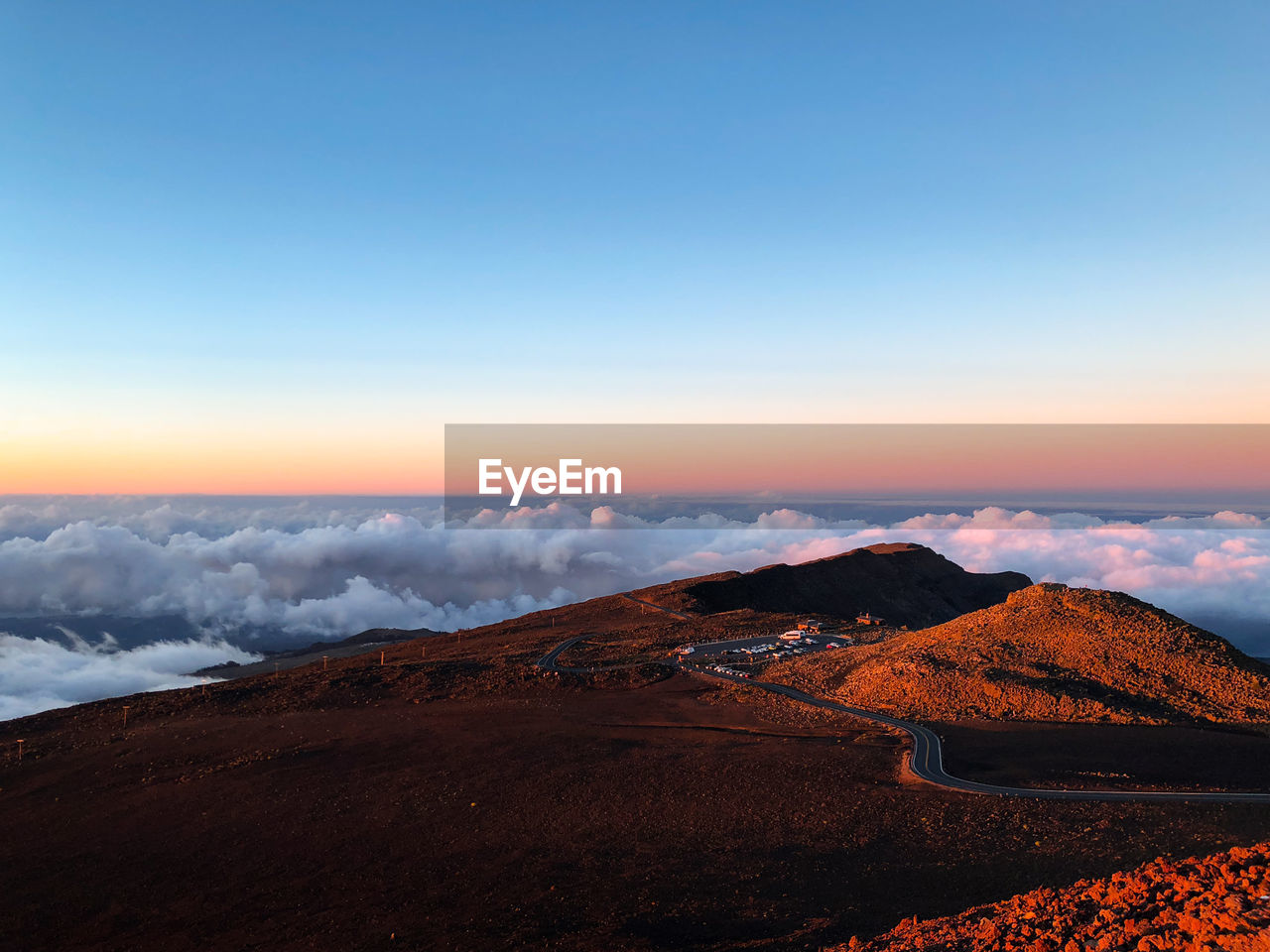 Scenic view of landscape against sky during sunset