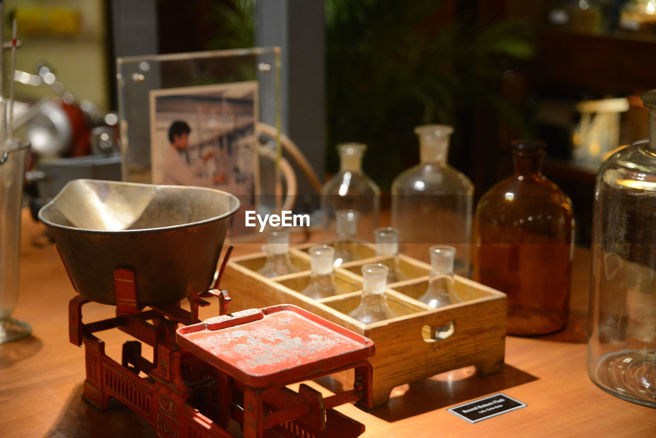 Close-up of wine bottles on table