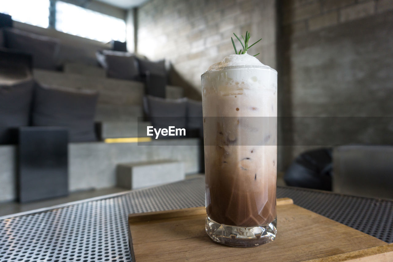 Close up of a glass of iced cocoa drink