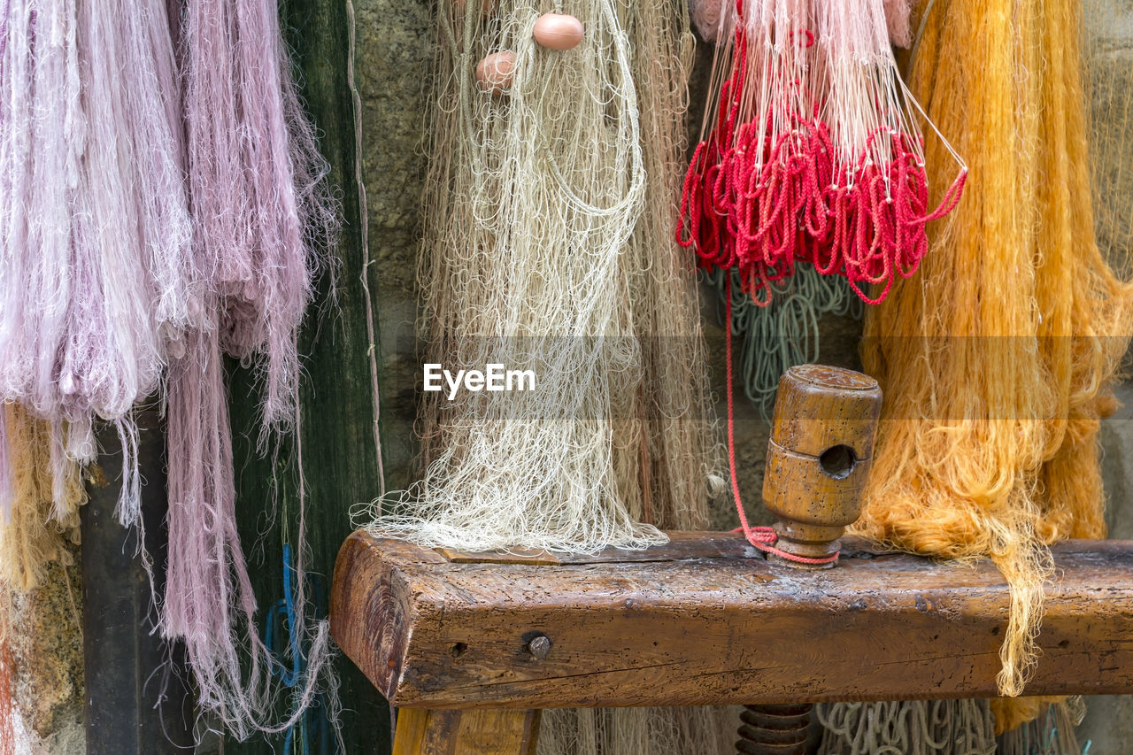 Fishing nets hanging on wall