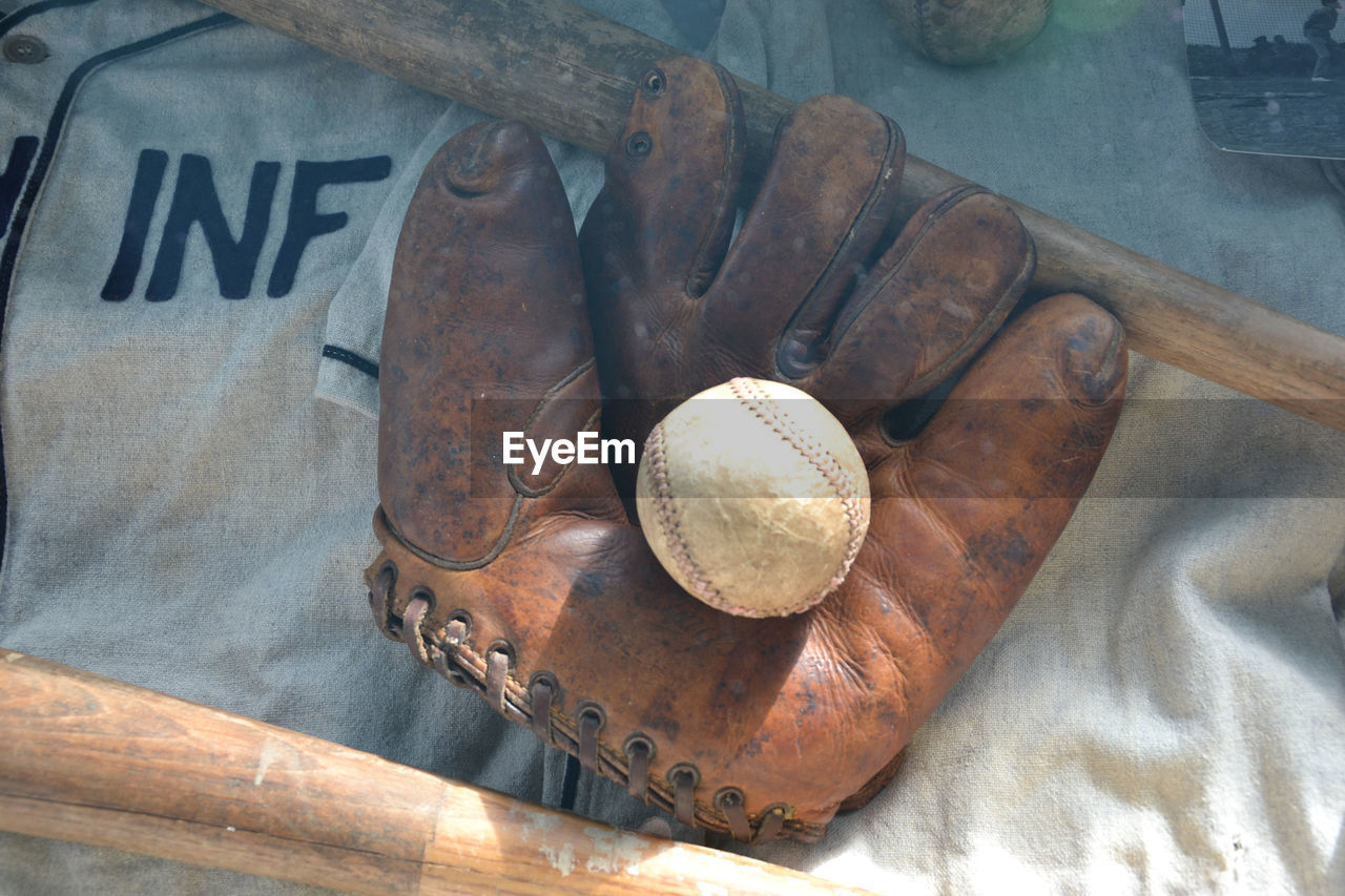 Close-up high angle view of baseball glove from wwii