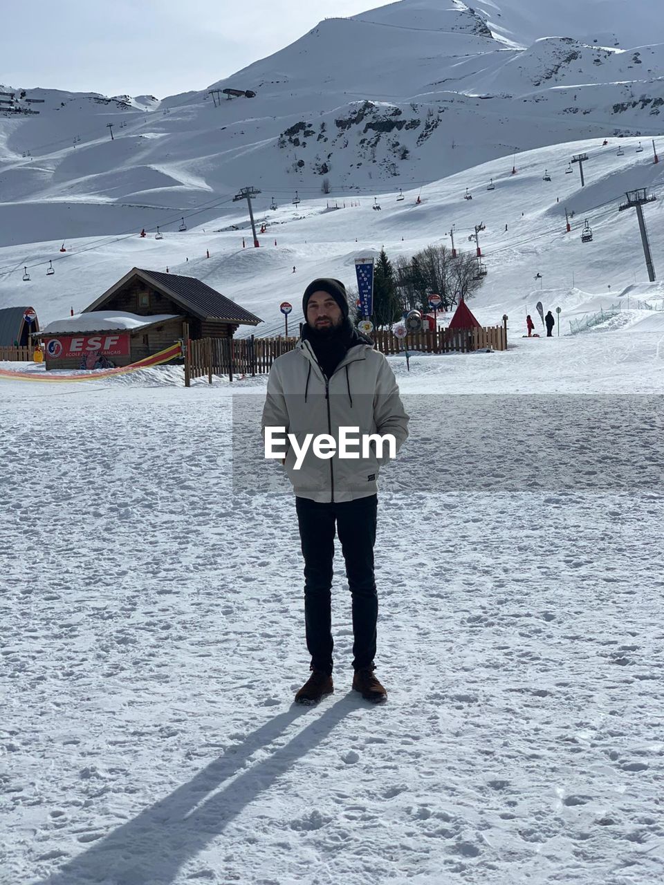 Full length of man on snow covered mountain