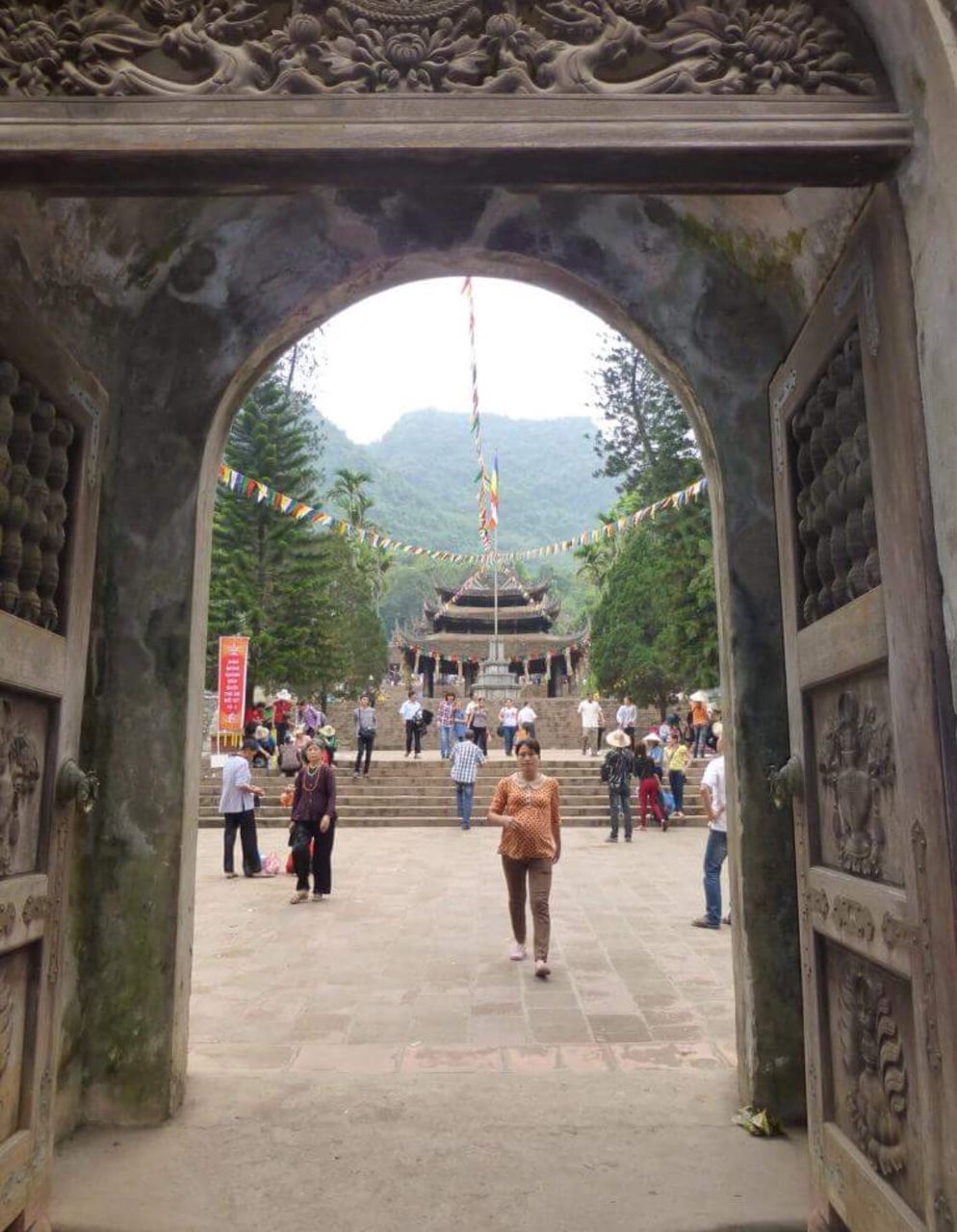 TOURISTS VISITING TEMPLE