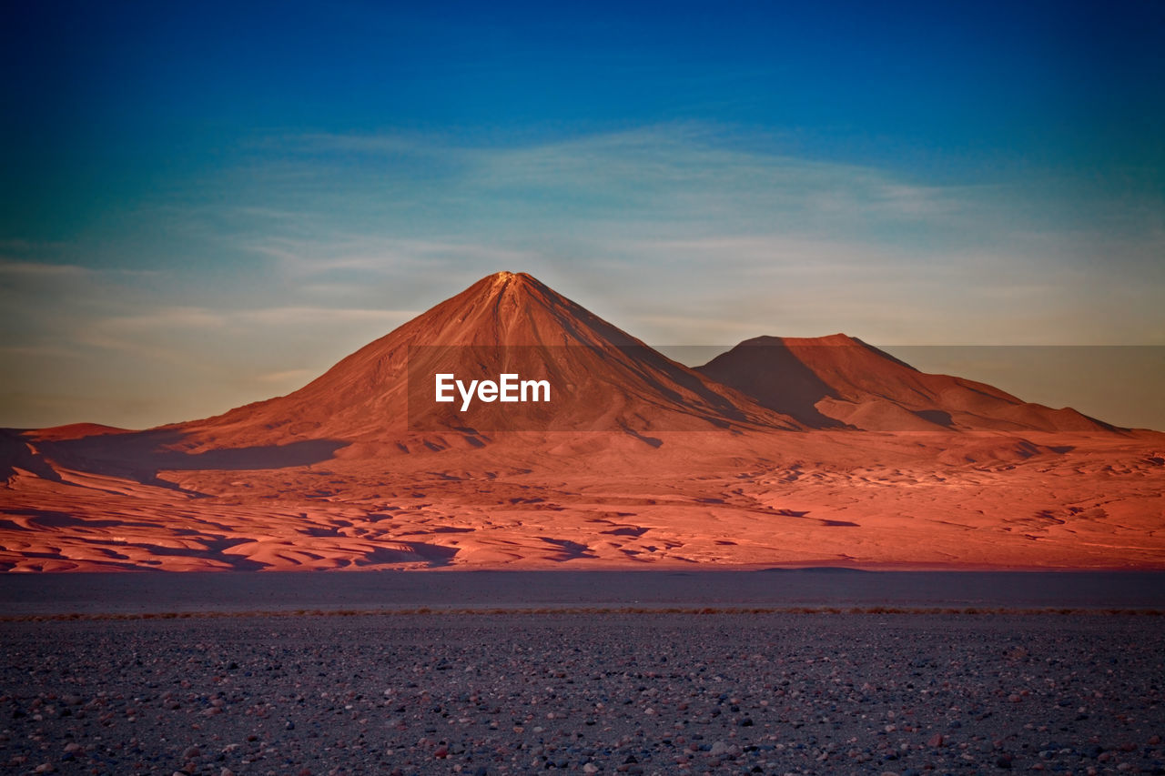 VIEW OF ARID LANDSCAPE AGAINST SKY