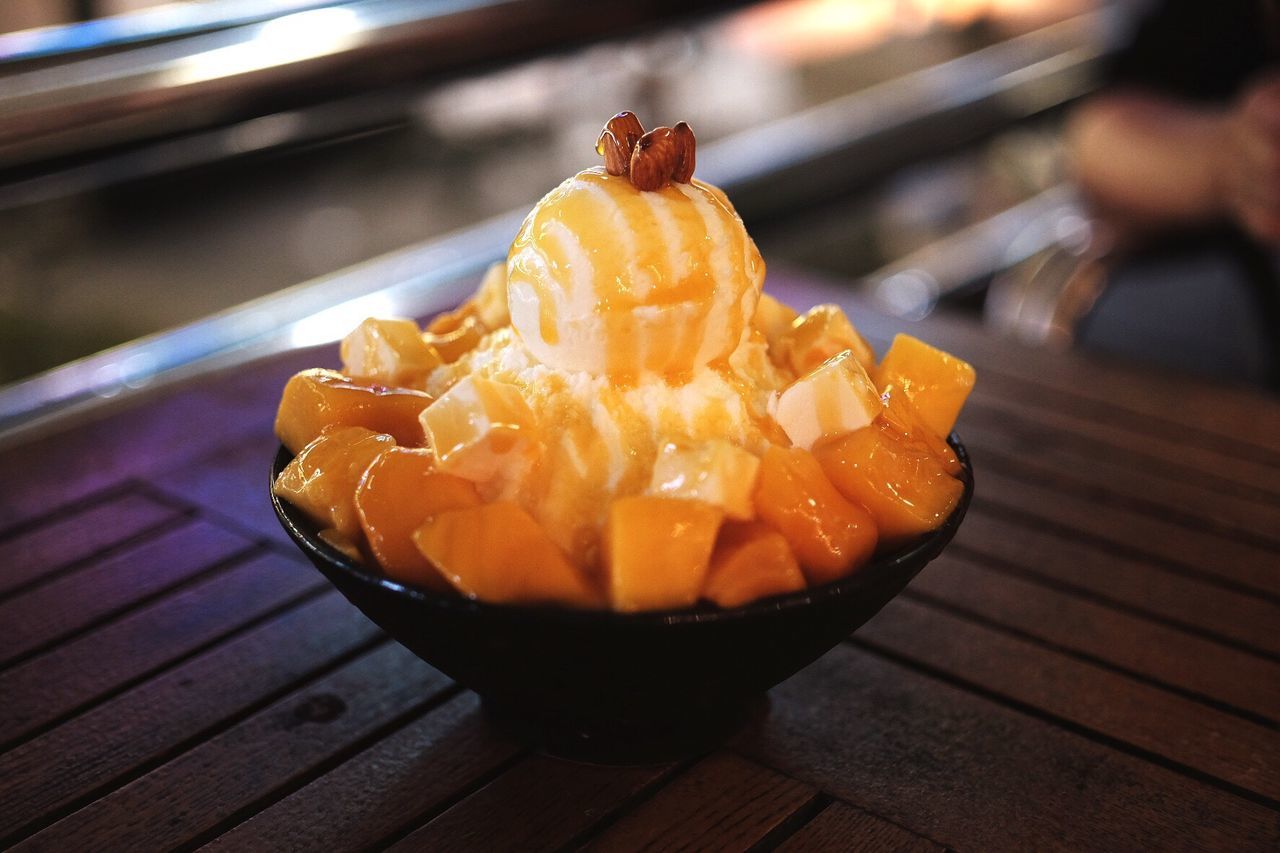 Close-up of ice cream on table