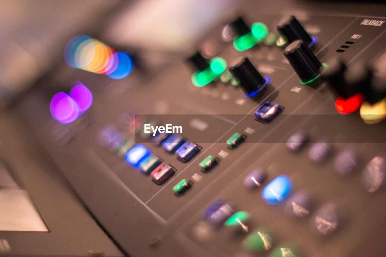 Close-up of illuminated sound mixer