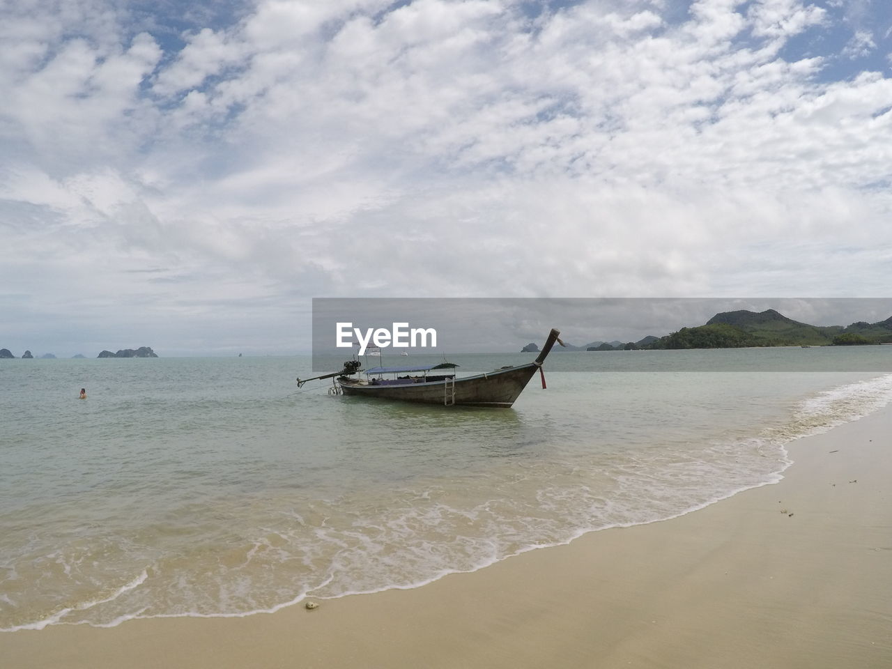 Boat anchored at beach