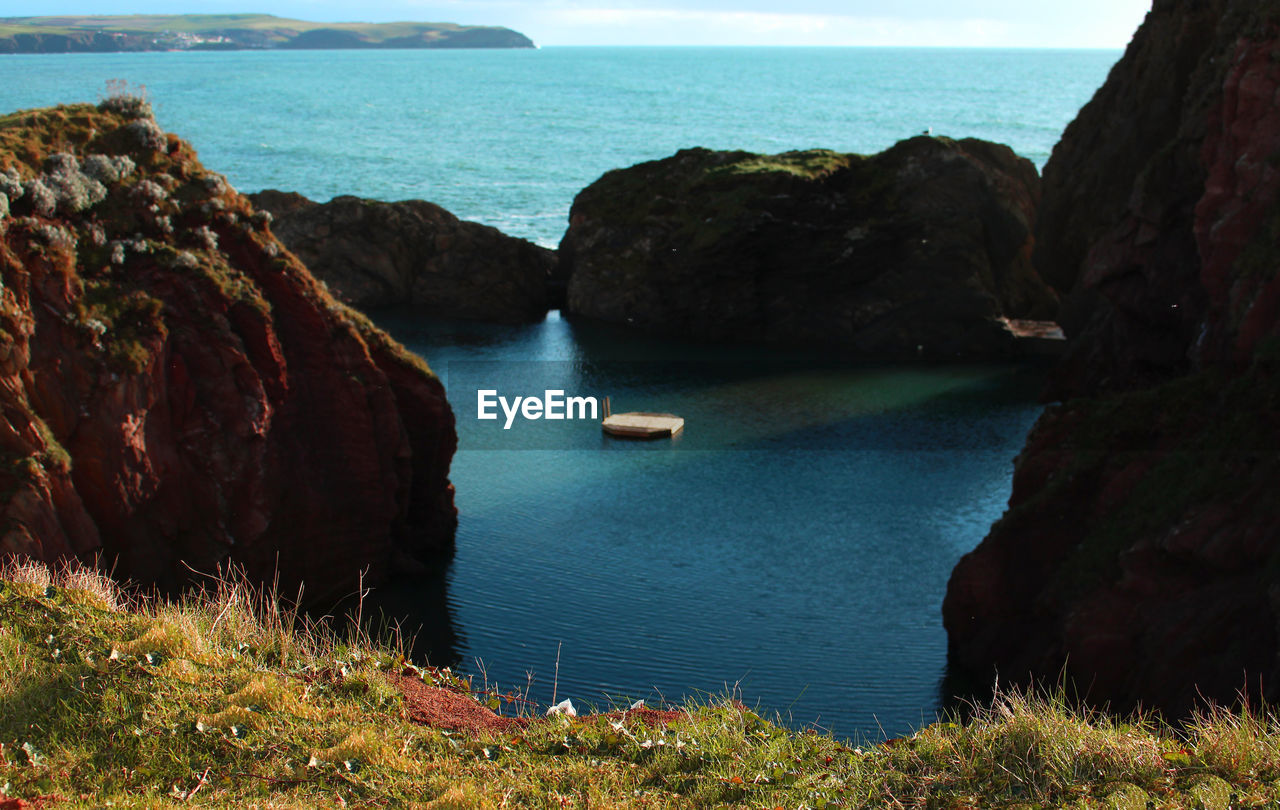 SCENIC VIEW OF SEA AND CLIFFS