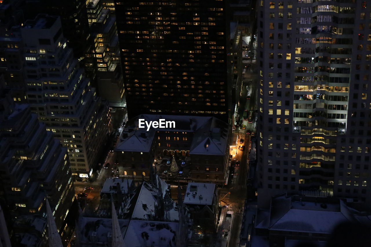 High angle view of illuminated buildings at night