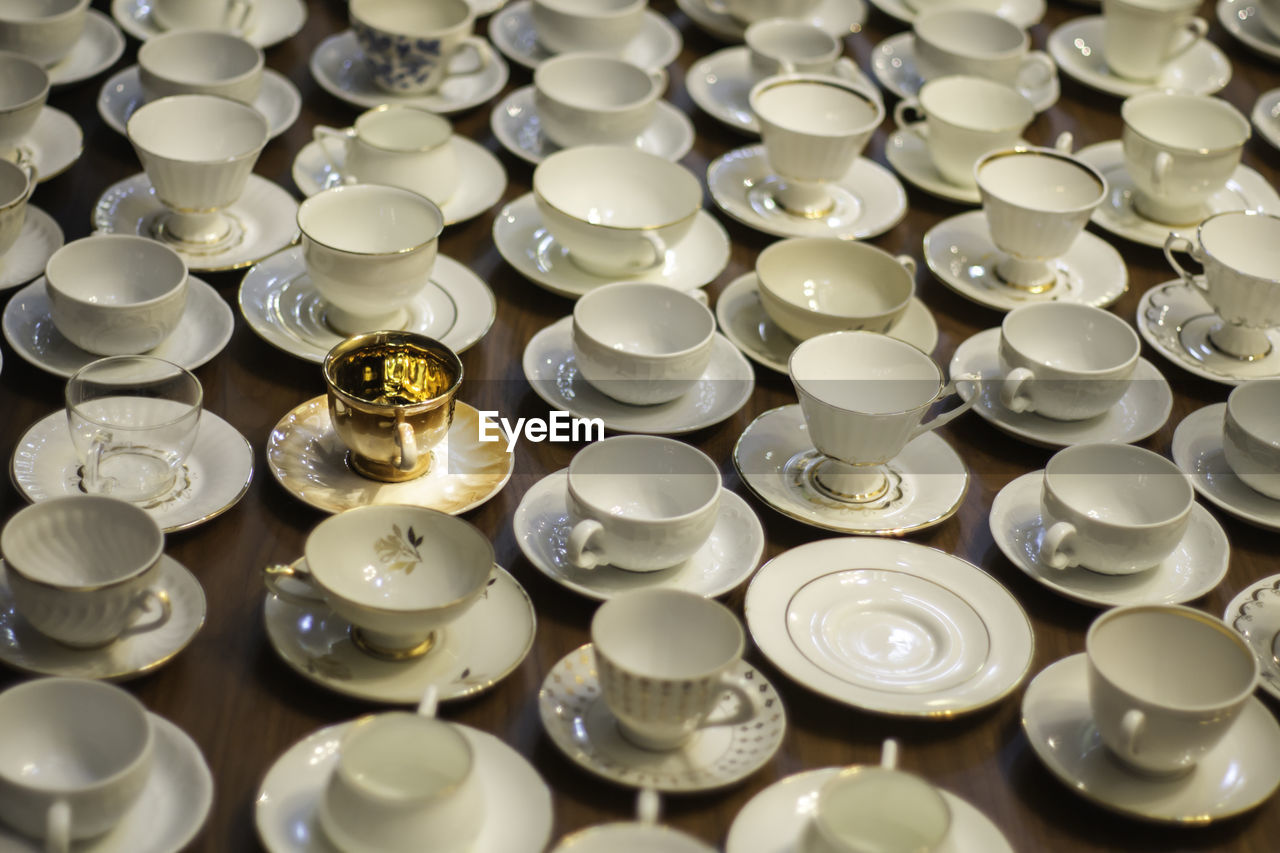 High angle view of various coffee cups arranged on table