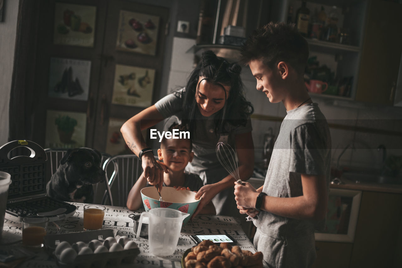 Young couple standing at home