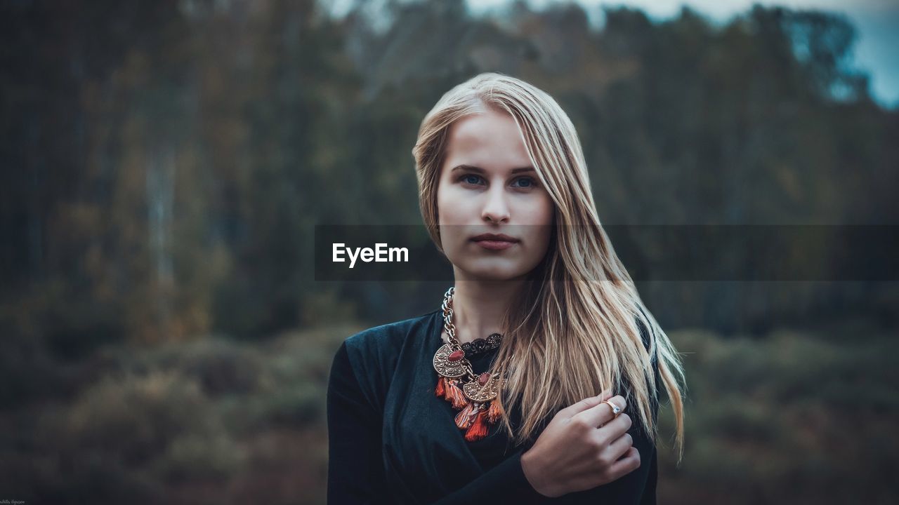 Portrait of a young woman outdoors