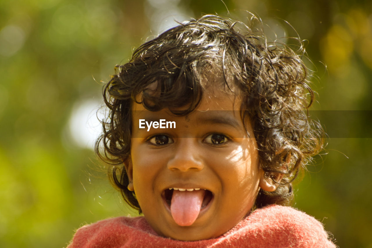 childhood, child, portrait, close-up, smiling, one person, headshot, emotion, person, human face, mouth open, facial expression, human mouth, laughing, cute, skin, happiness, toddler, nature, fun, men, portrait photography, looking at camera, innocence, human head, baby, nose, curly hair, female, human eye, cheerful, outdoors, front view, day, lifestyles, shouting, enjoyment, wet, positive emotion, summer, teenager