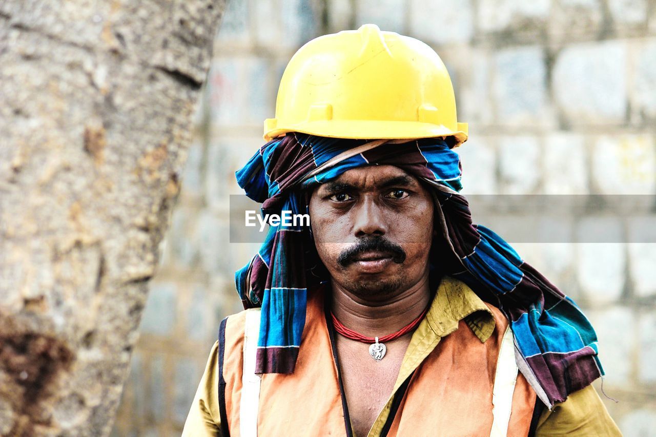 Portrait of construction worker wearing hardhat