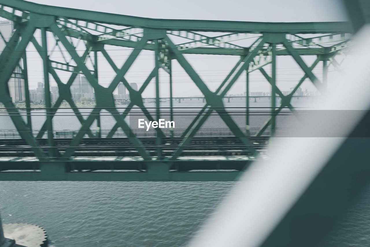 LOW ANGLE VIEW OF SUSPENSION BRIDGE