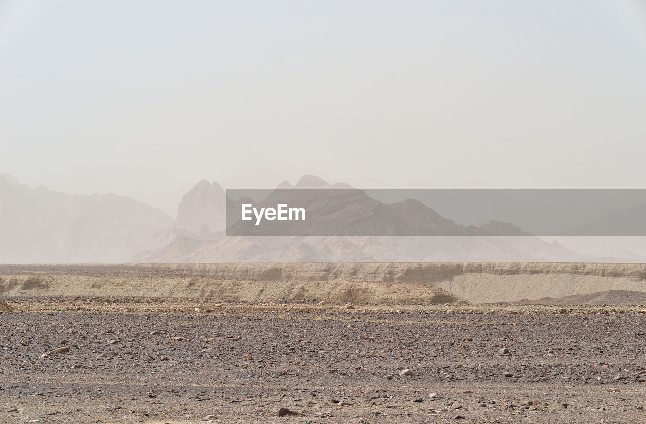 Scenic view of desert against sky