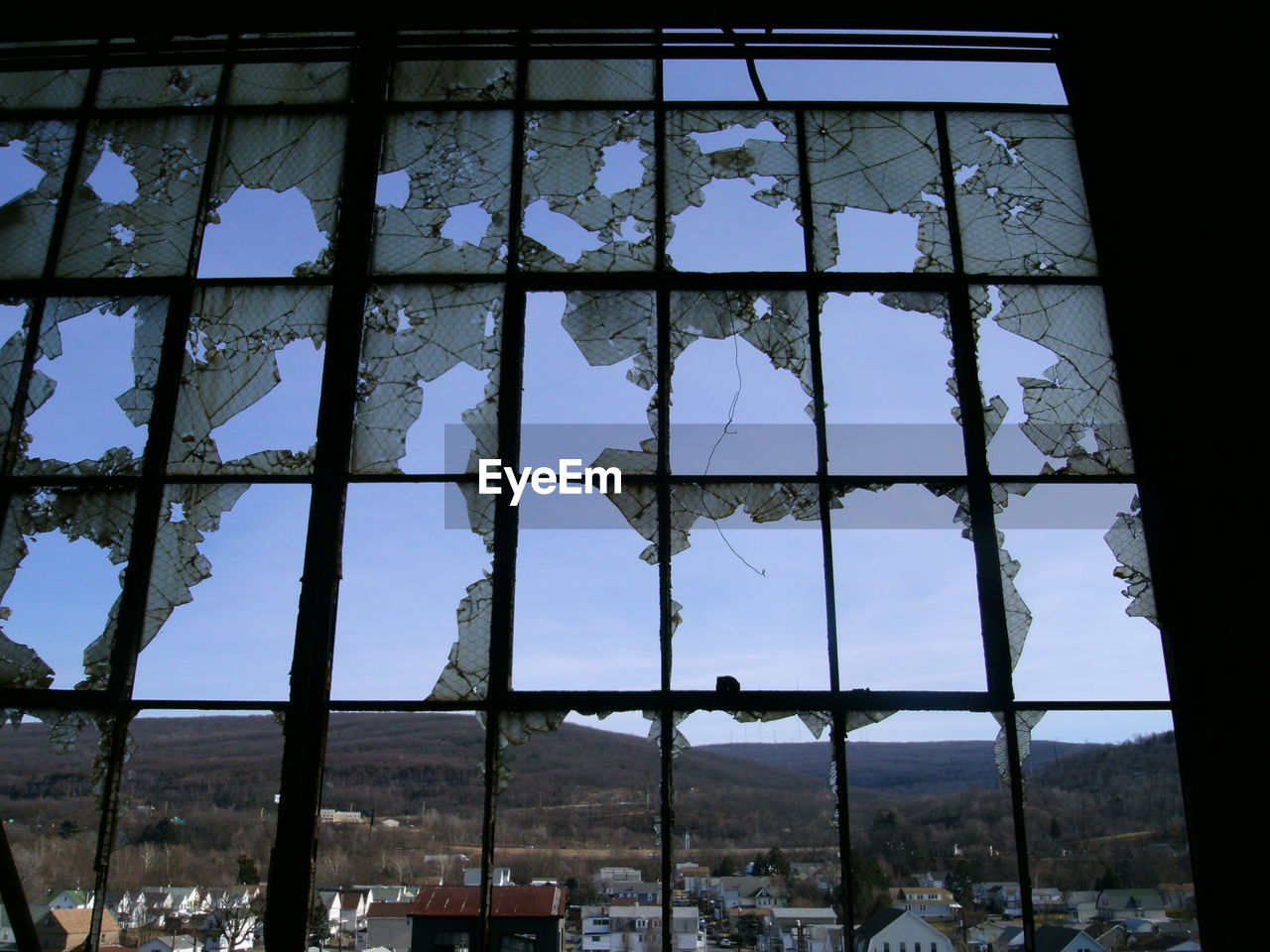 Townscape seeing through crashed windows