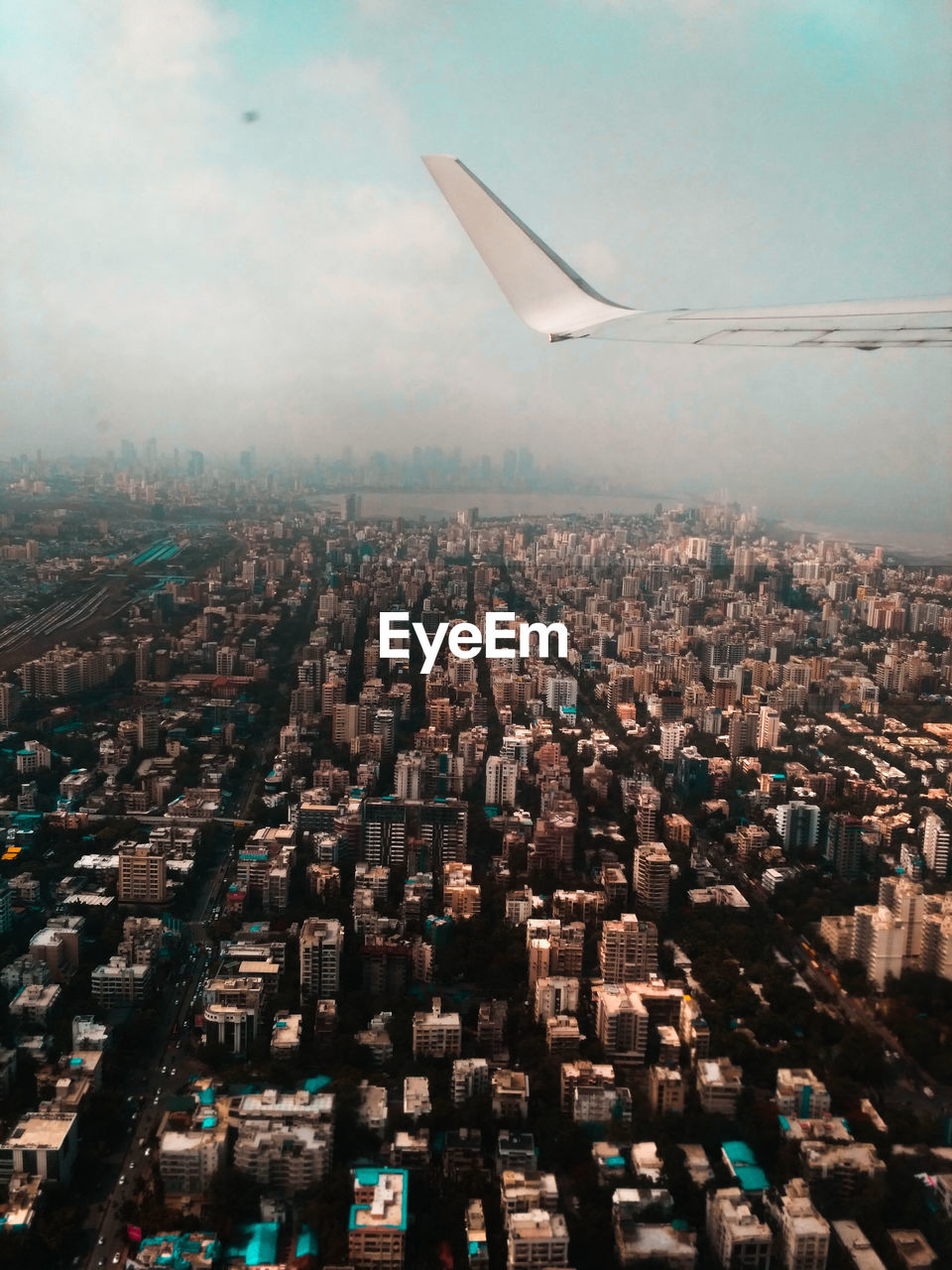 View of cityscape seen through airplane