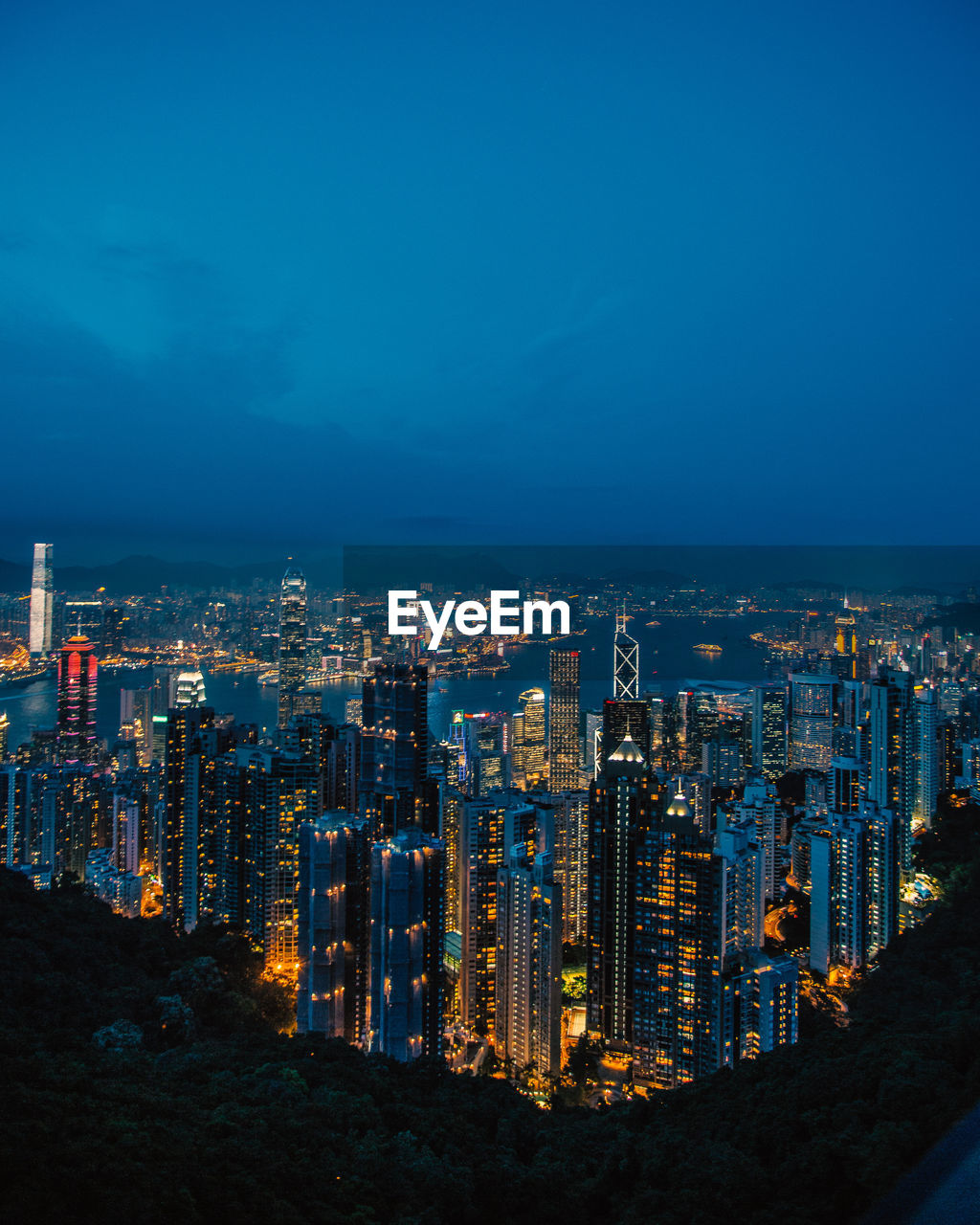 Illuminated buildings in city at night