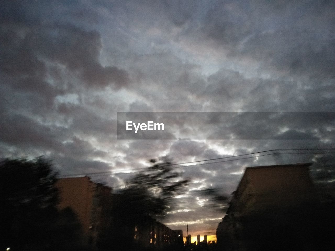 LOW ANGLE VIEW OF STORM CLOUDS IN SKY