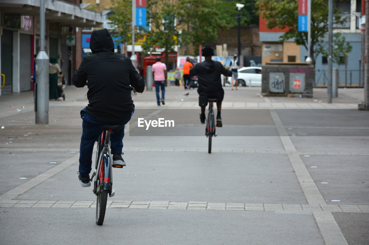 PEOPLE WALKING ON STREET