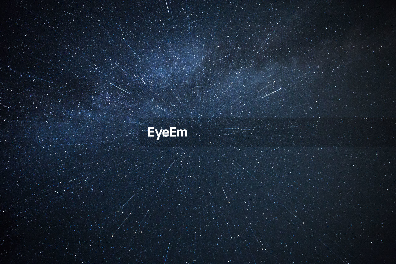 Full frame shot of star field against sky at night