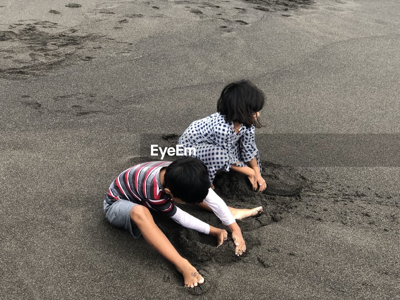 High angle view of friends on shore