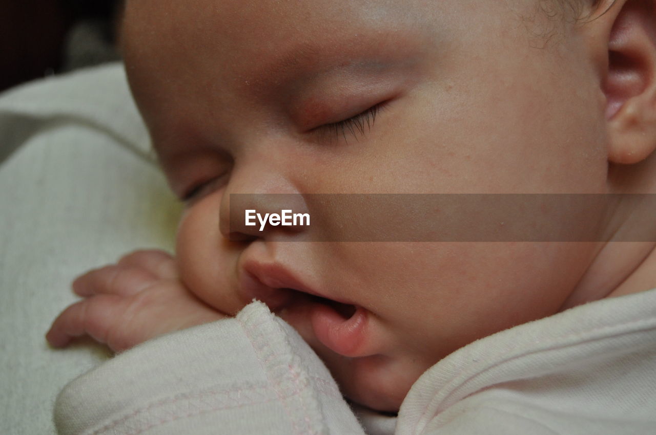 Close-up of baby girl sleeping