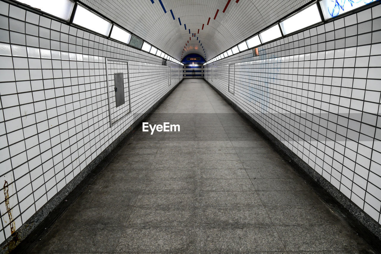 Long empty underground subway path