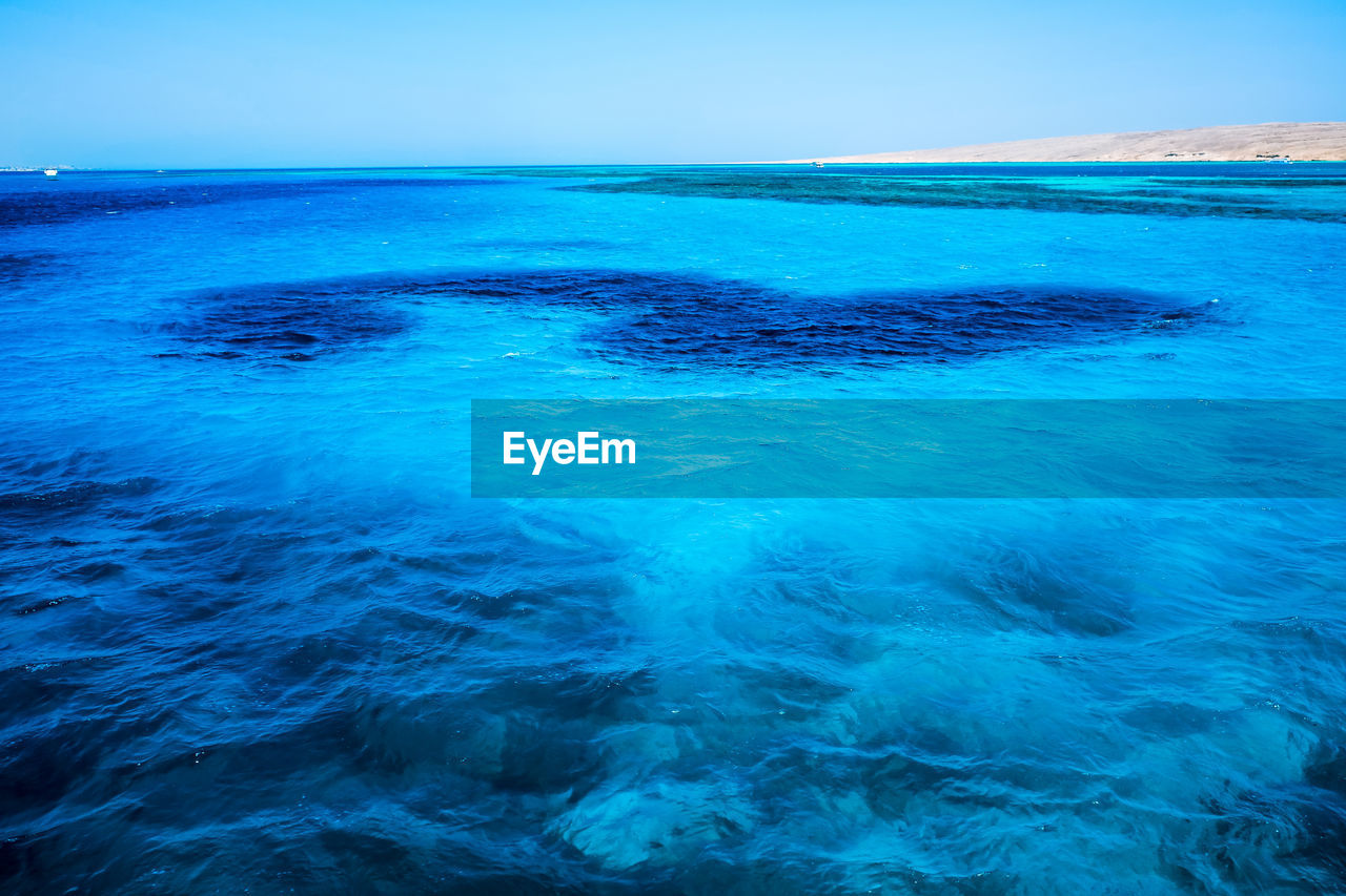 SCENIC VIEW OF SEA AGAINST BLUE SKY