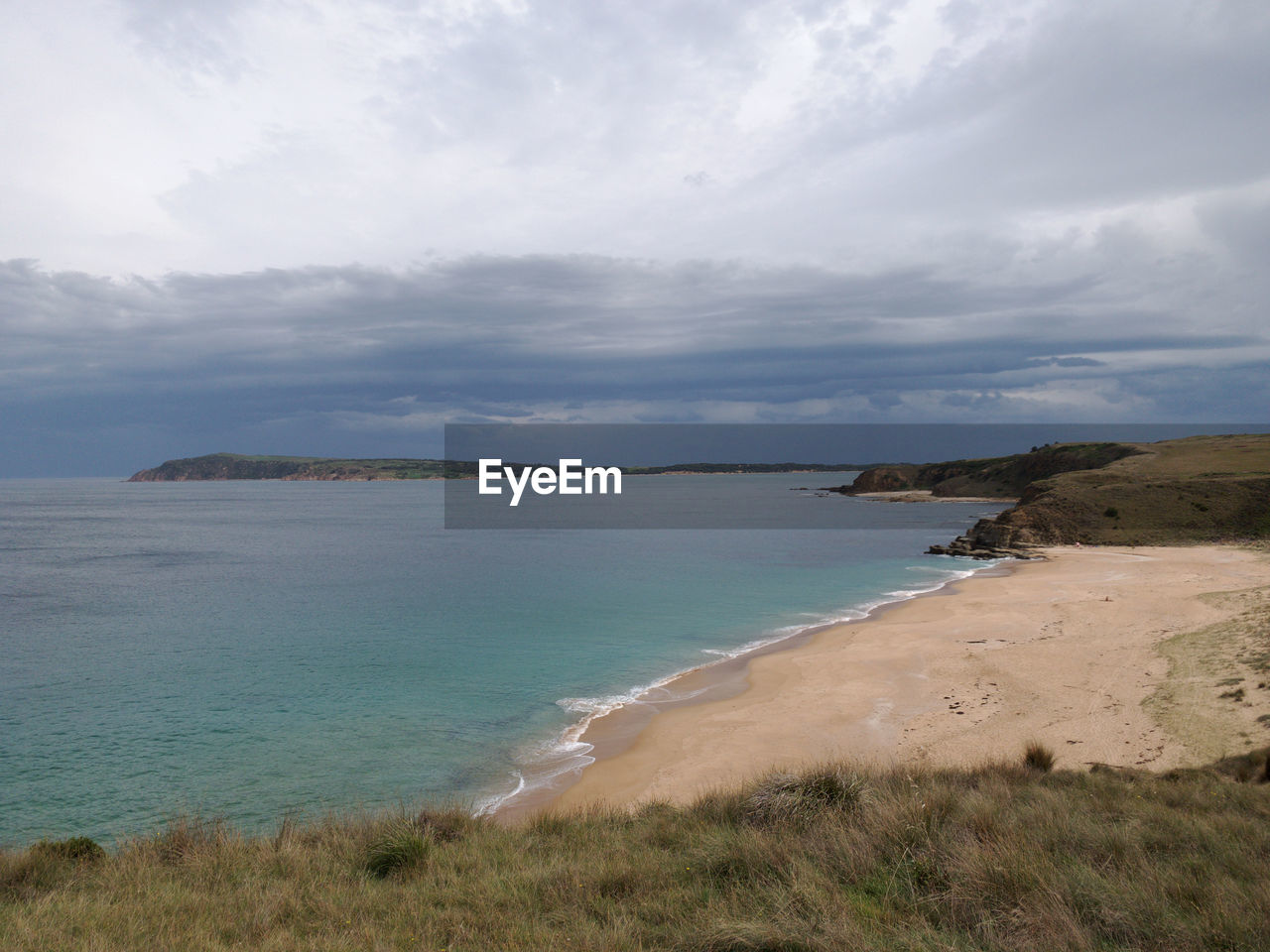 VIEW OF BEACH AGAINST SKY