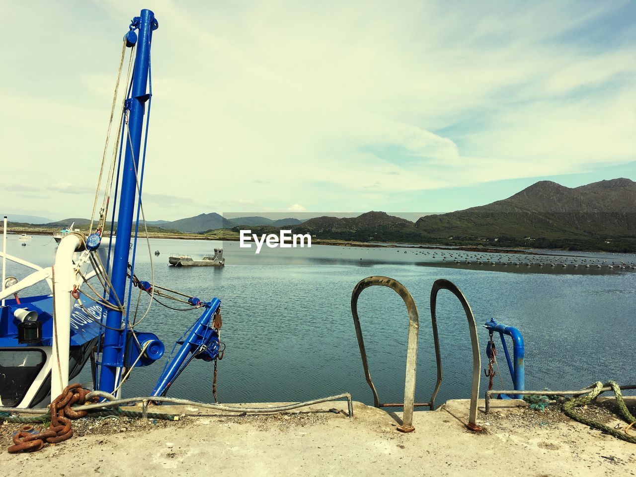 Scenic view of sea against blue sky