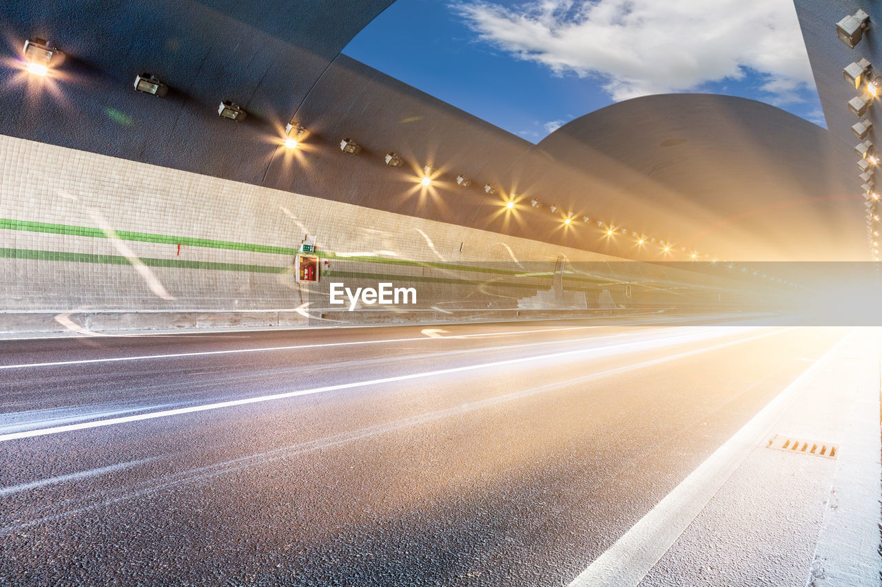 BLURRED MOTION OF LIGHT TRAILS ON ROAD