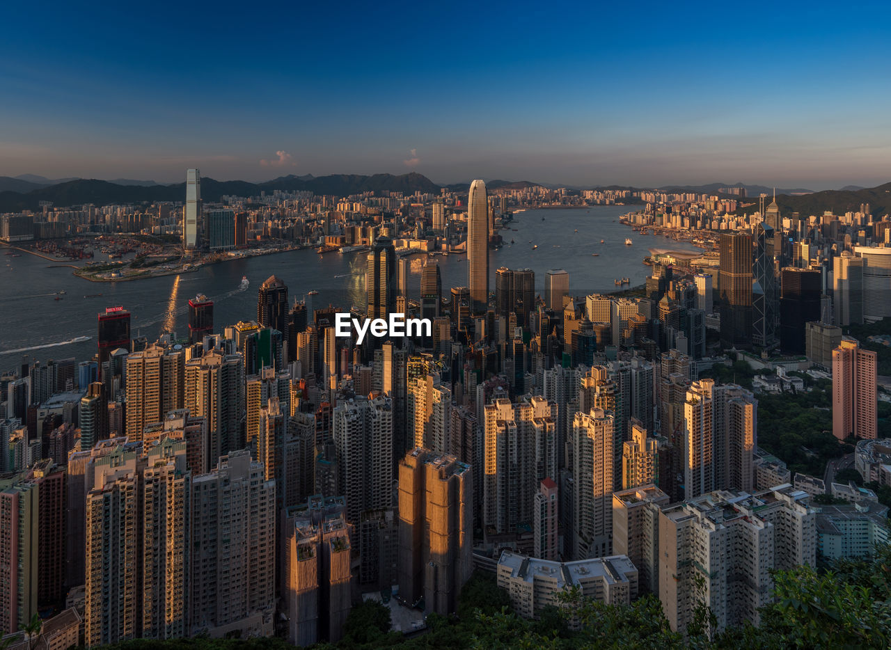 High angle view of cityscape against sky during sunset