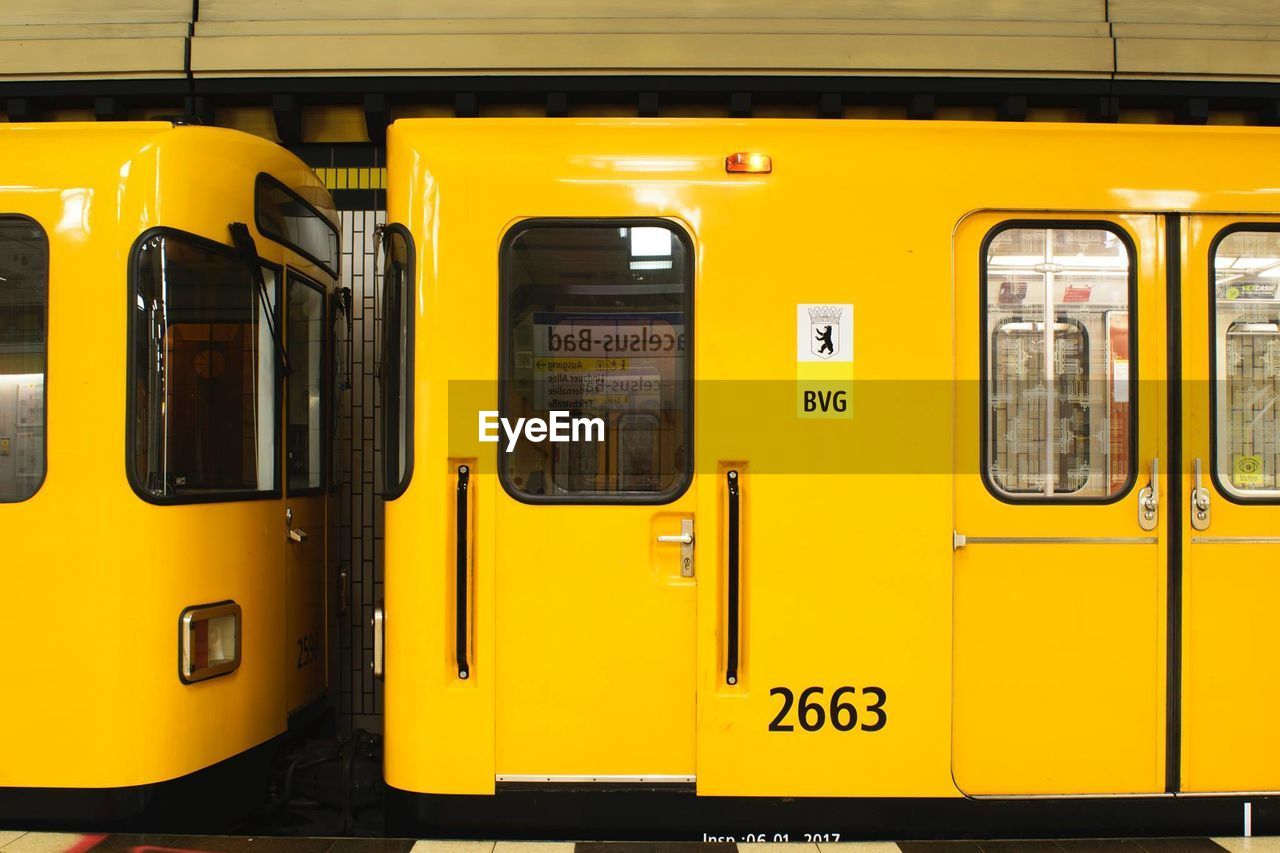 YELLOW TRAIN ON WINDOW