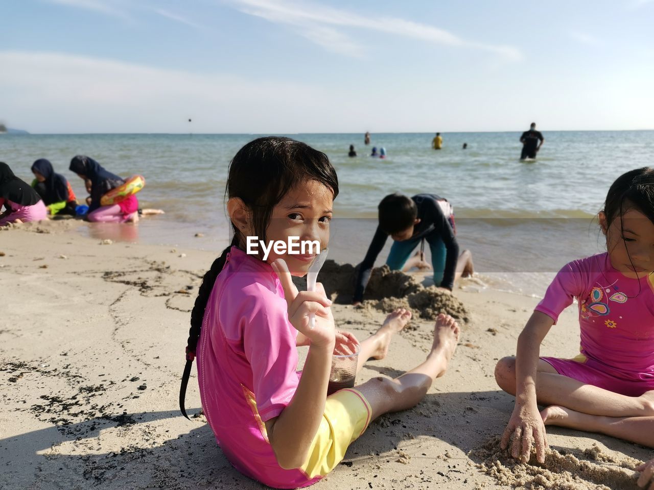 Women sitting on beach