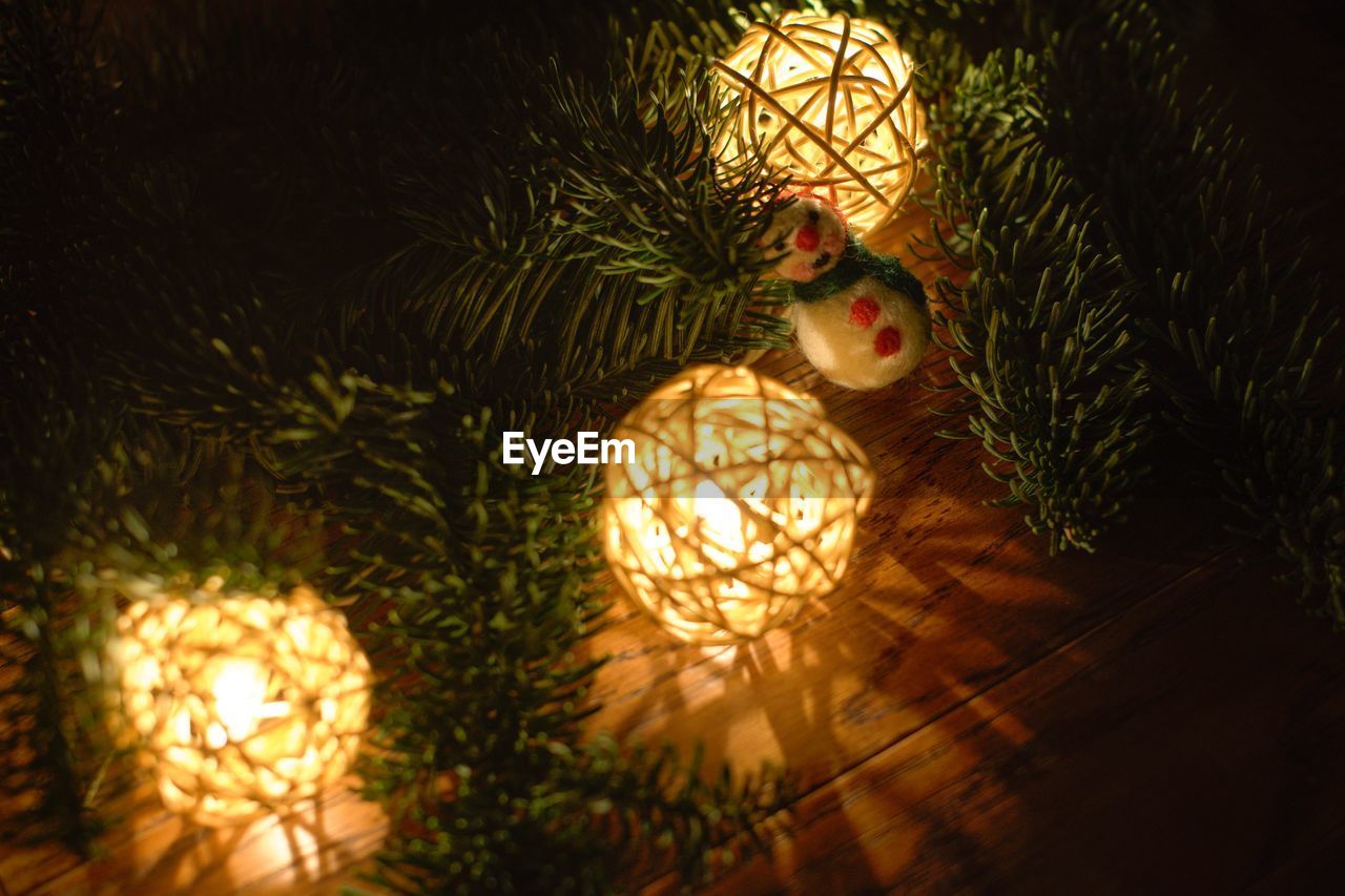 High angle view of illuminated christmas decoration on table