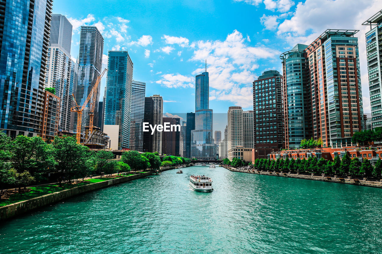 Trump international hotel & tower - chicago by chicago river against sky