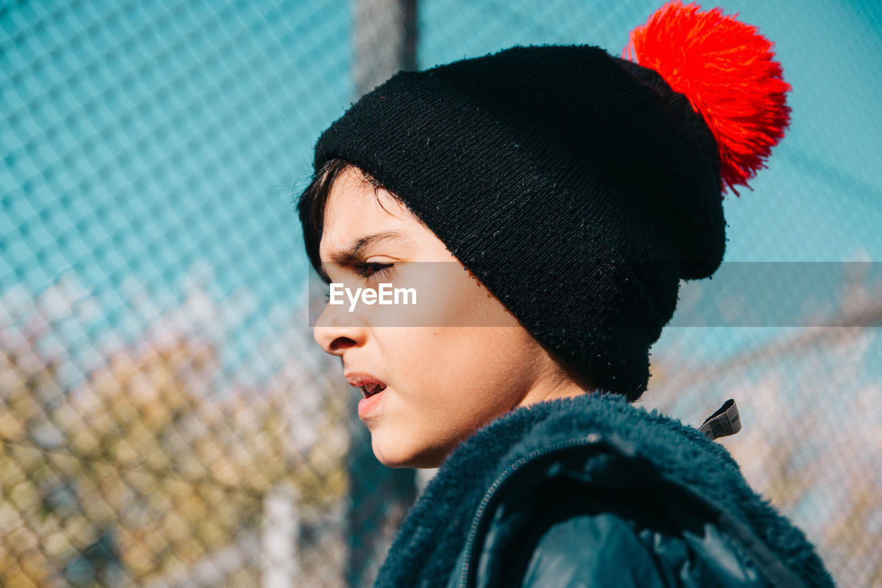 Portrait of little boy wearing warm clothing