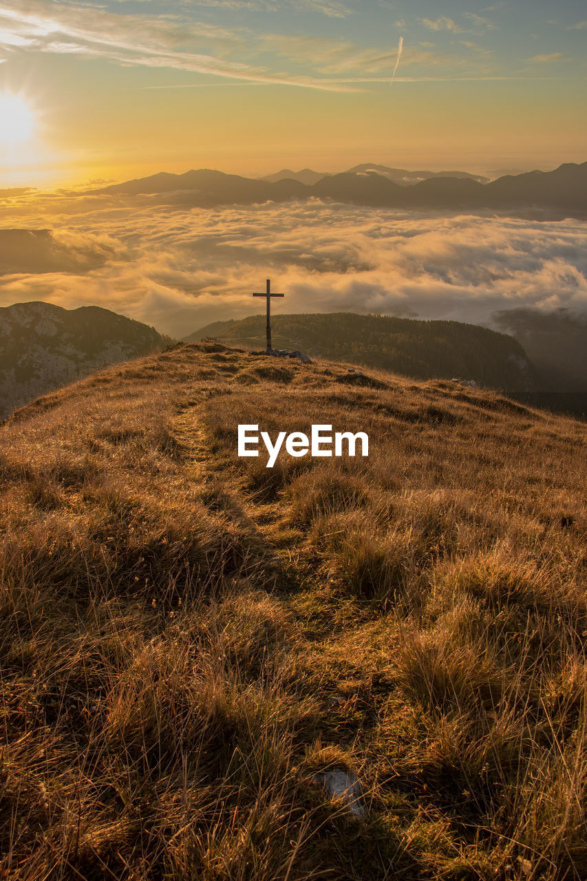 Scenic view of mountains against sky during sunset