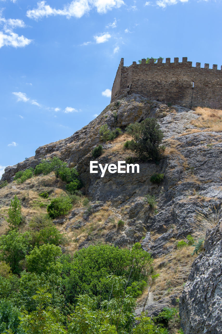 Low angle view of fort on mountain