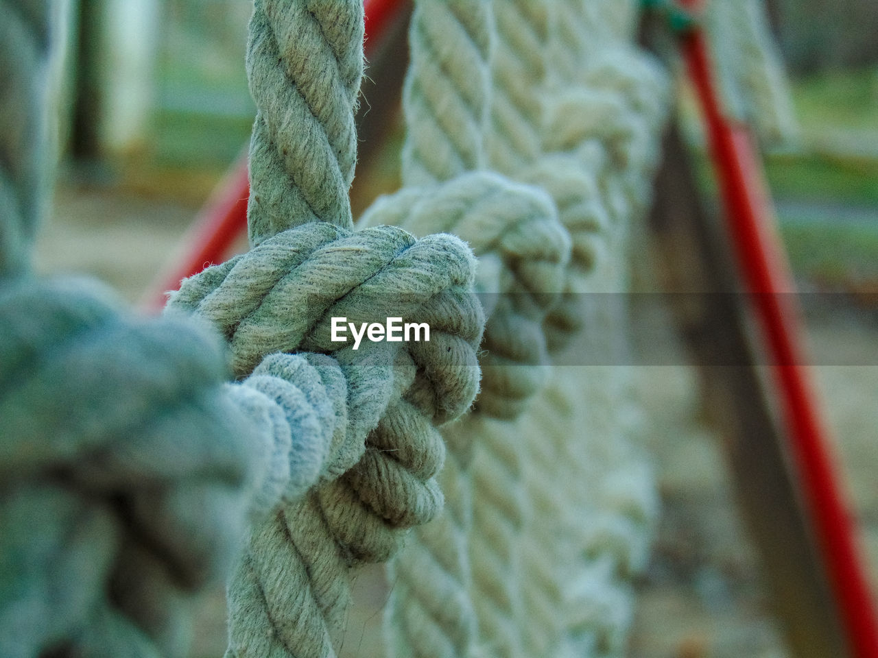 Close-up of rope tied on metal