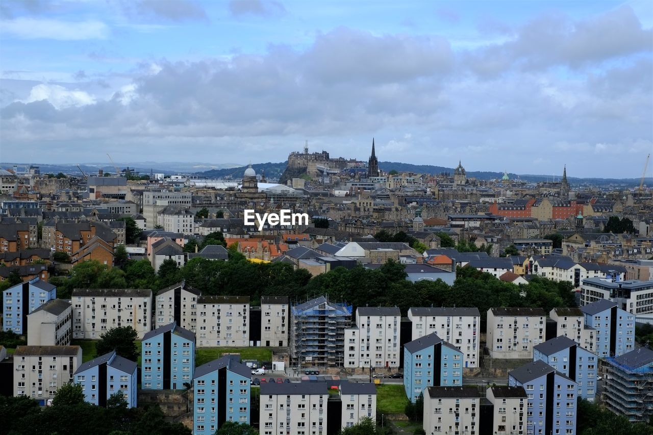 HIGH ANGLE VIEW OF BUILDINGS IN CITY