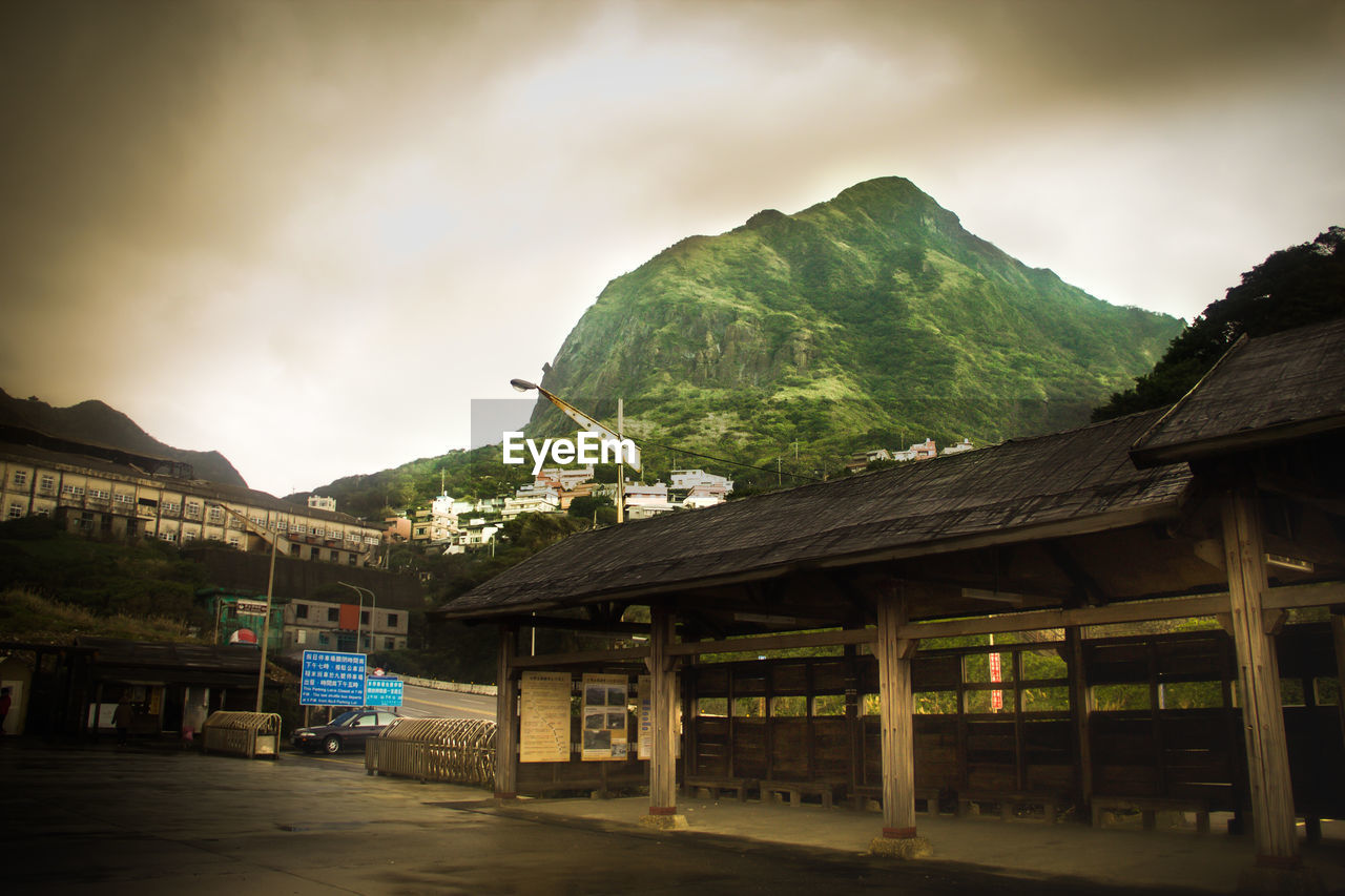 Houses with mountain range in background