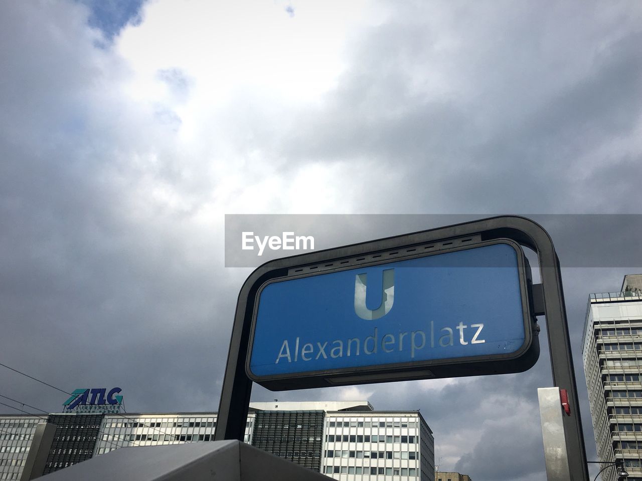 LOW ANGLE VIEW OF SIGN AGAINST SKY