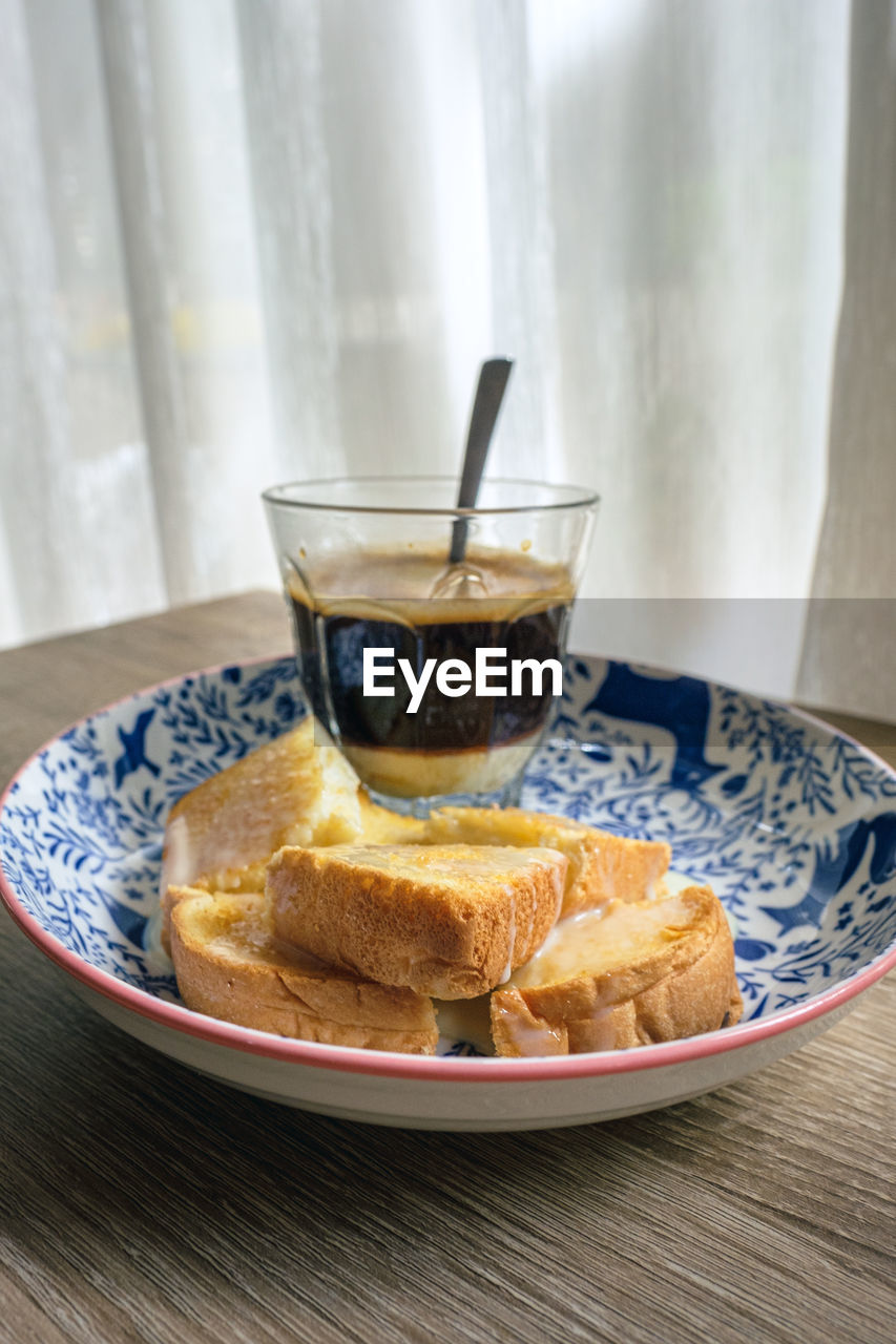 Close-up of breakfast served on table