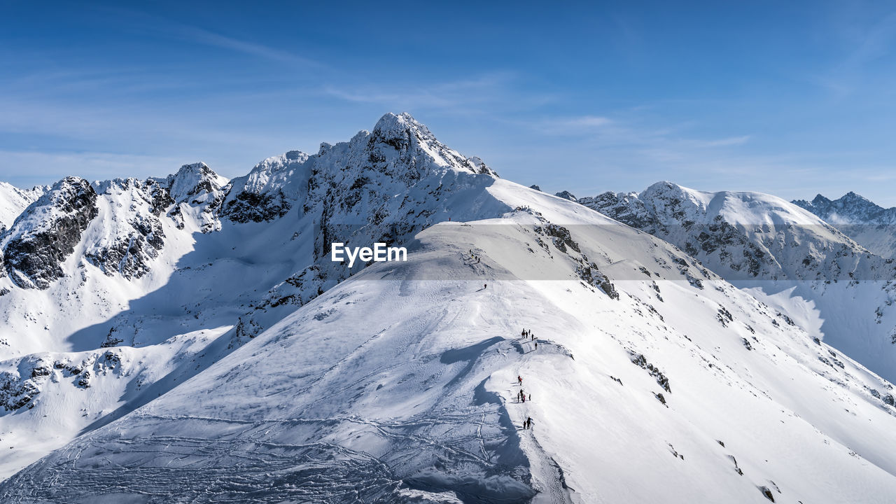 SNOWCAPPED MOUNTAIN AGAINST SKY