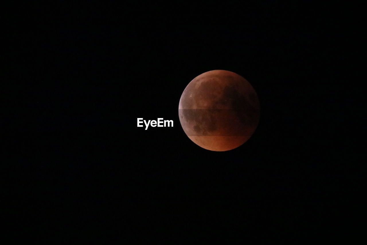 SCENIC VIEW OF MOON AGAINST SKY