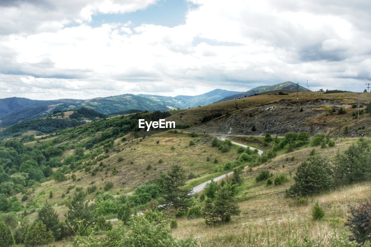 SCENIC VIEW OF MOUNTAIN AGAINST SKY