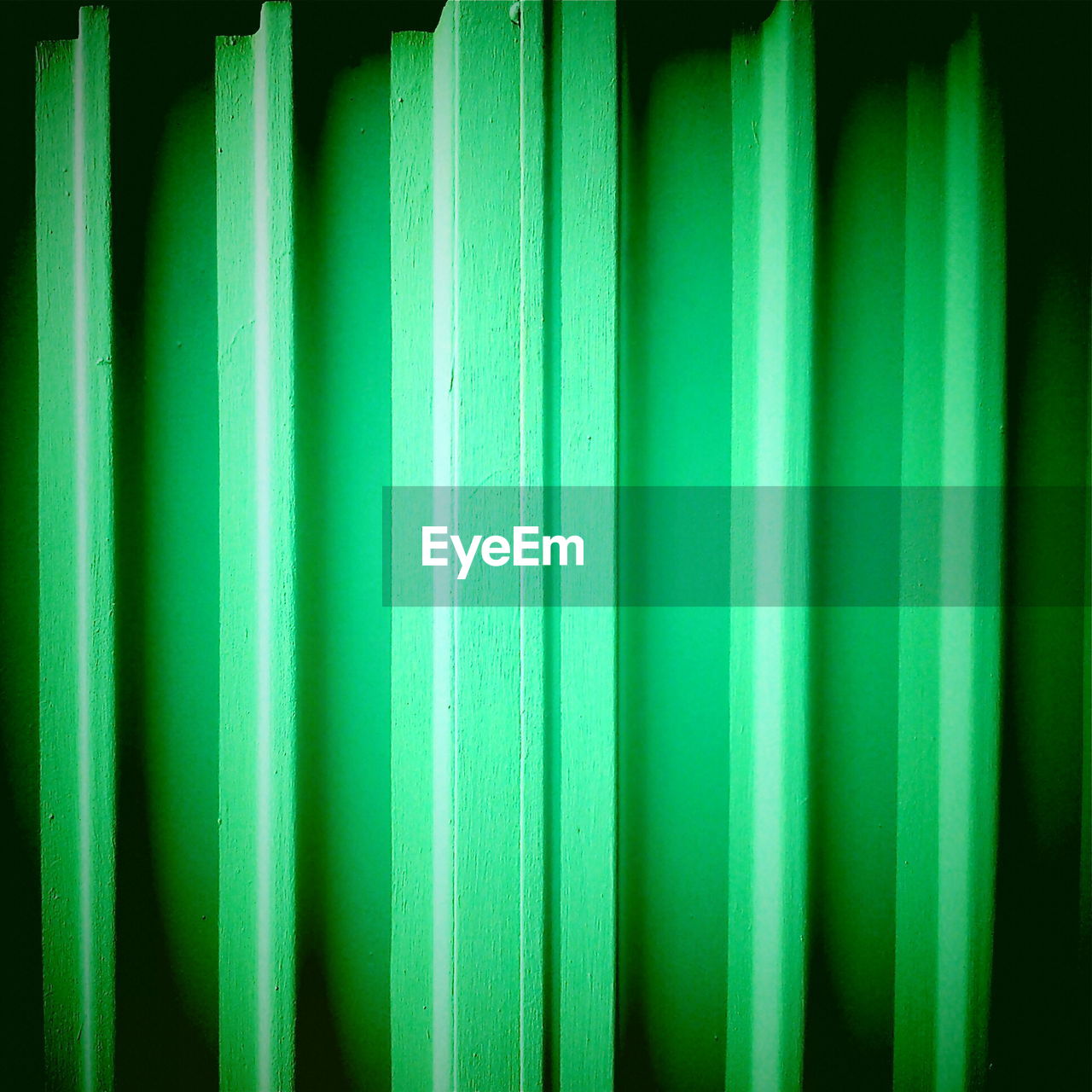 Full frame shot of green wooden wall